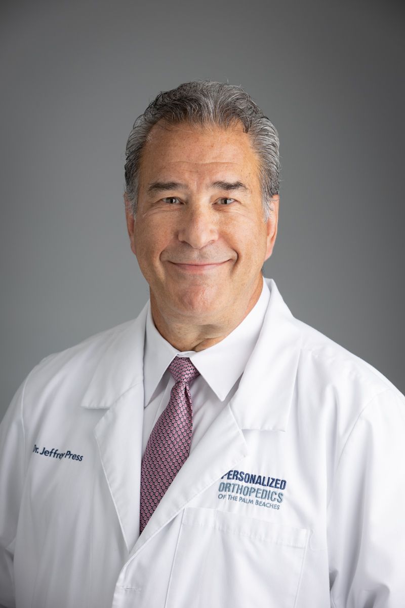 <img src="orthopedicsurgeon.jpg" alt="Dr. Jeffrey A. Press" />