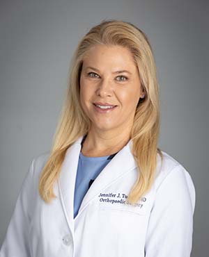 JENNIFER TUCKER, MD