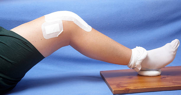 Closeup of total knee replacement patient exercising