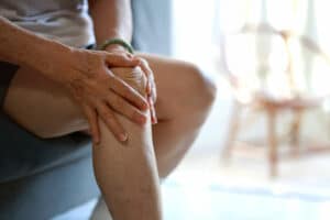Senior Woman suffering with Knee Pain