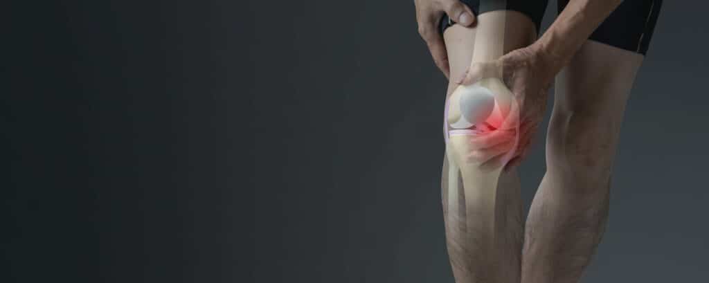 A man is experiencing joint pain, arthritis, and cartilage problems due to knee ligament injuries.