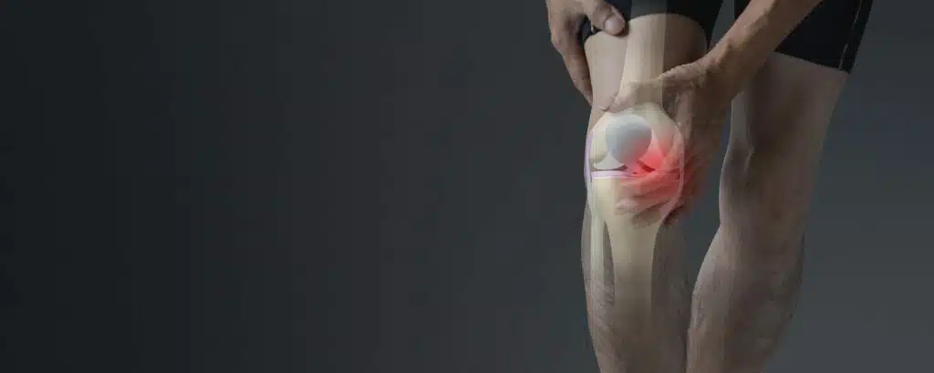 A man is experiencing joint pain, arthritis, and cartilage problems due to knee ligament injuries.